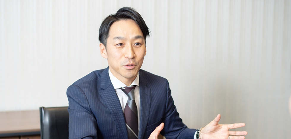 栃尾 祐介